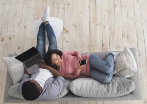 happy-couple-on-couch